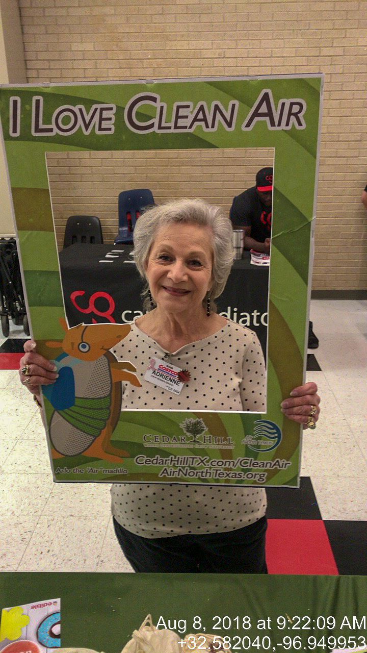 Woman Holding "I Love Clean Air" Frame